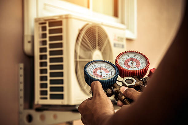 Professional Air Conditioning Service technician working in South Orange, NJ